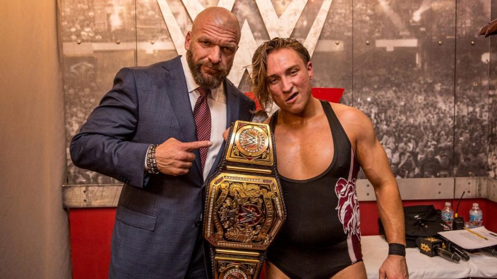 WWE - Triple H with United Kingdom champion Pete Dunne