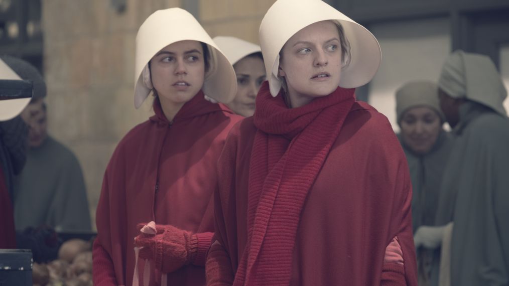 The Handmaid's Tale -- "Women's Work" - Episode 208 - A sick baby tests Offred and Serena. Janine finally faces Naomi. The Commander struggles to recover from a terrifying ordeal. Ofrobert (Nina Kiri) and Offred (Elisabeth Moss), shown. (Photo by: George Kraychyk/Hulu)