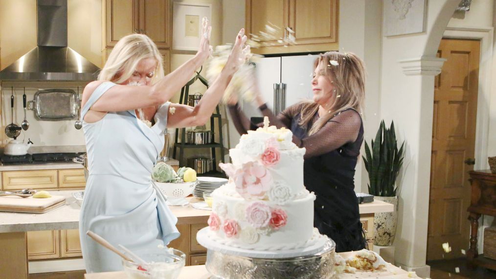 brooke and taylor in a kitchen cake fight, a two tier wedding cake