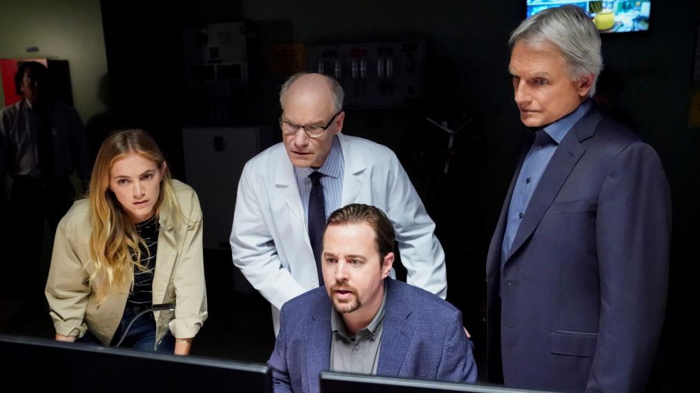 NCIS'Destiny's Child' -- Coverage of the CBS series NCIS, scheduled to air on the CBS Television Network. Pictured: Emily Wickersham, (ID TK), Sean Murray (seated), Mark Harmon.