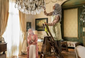 Marthe Keller as Anushka watches Inès Melab as Hajar work in The Violet Hour