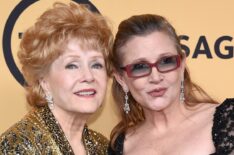 Actresses Debbie Reynolds, recipient of the Screen Actors Guild Life Achievement Award, and Carrie Fisher pose in the press room at the 21st Annual Screen Actors Guild Awards