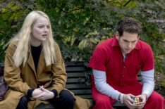 Maniac - Emma Stone and Jonah Hill sitting no a park bench in disbelief