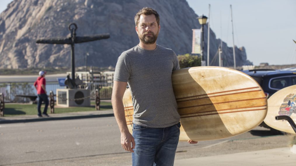 Joshua Jackson with surfboard in The Affair