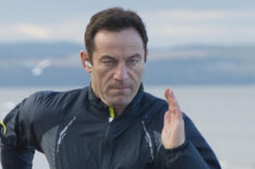 Jason Isaacs as Jackson Brodie running on the beach in Case Histories