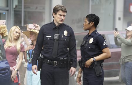 Nathan Fillion and Afton Williamson in The Rookie