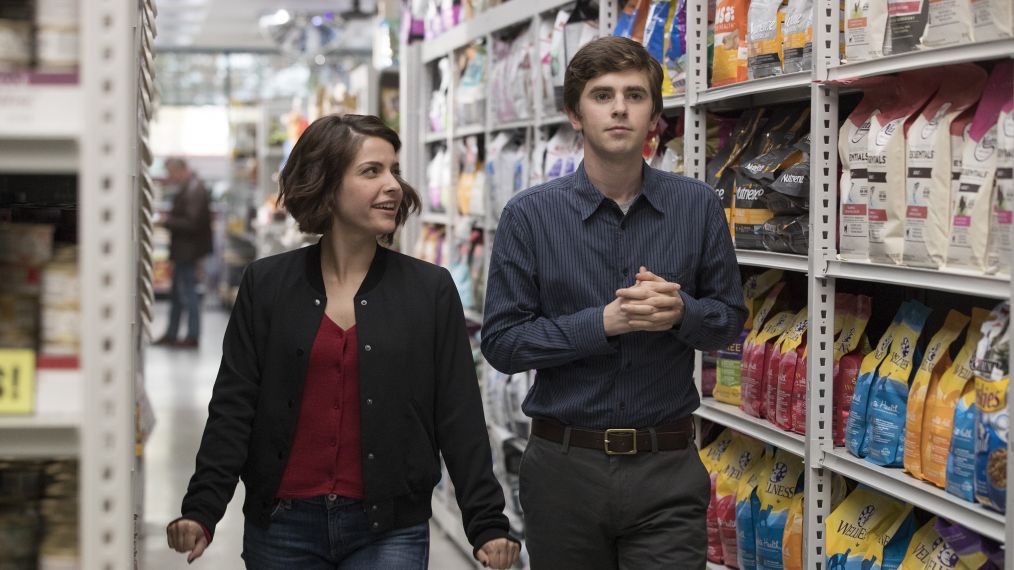 Paige Spara and Freddie Highmore walking through a grocery store in The Good Doctor