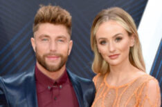 Singer Chris Lane and TV personality Lauren Bushnell attend The 52nd Annual CMA Awards