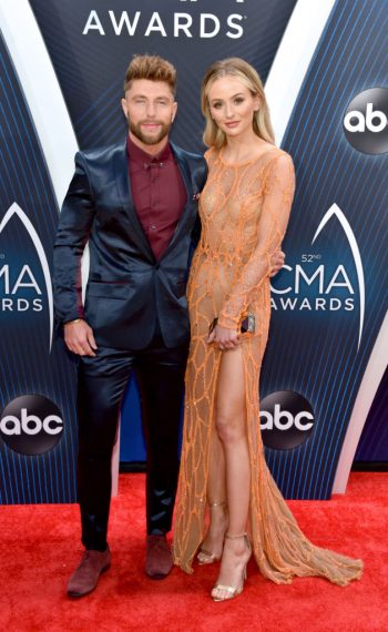 Singer Chris Lane and TV personality Lauren Bushnell attend The 52nd Annual CMA Awards