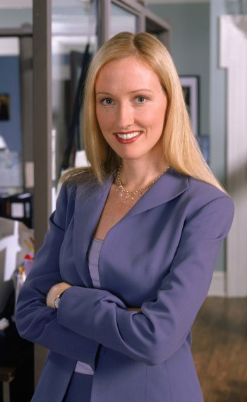 Janel Moloney stars as Staff Assistant Donna Moss on NBC's West Wing