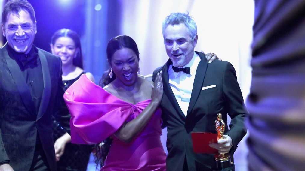 Angela Bassett poses with Foreign Language Film winner Alfonso Cuaron backstage during the 91st Annual Academy Awards