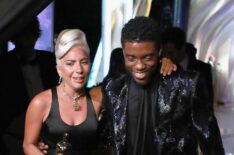 Lady Gaga poses with the Music (Original Song) award for 'Shallow' from 'A Star Is Born' backstage with presenter Chadwick Boseman during the 91st Annual Academy Awards