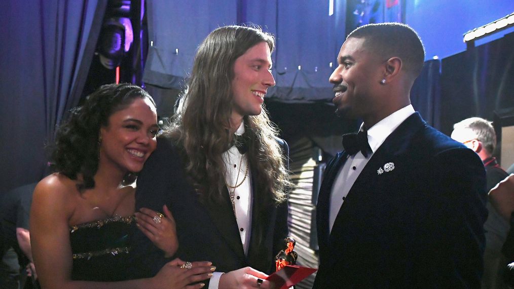 Tessa Thompson and Michael B. Jordan pose backstage after presenting the Best Original Score award for 'Black Panther' to Ludwig Goransson during the 91st Annual Academy Awards