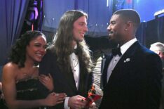 Tessa Thompson and Michael B. Jordan pose backstage after presenting the Best Original Score award for 'Black Panther' to Ludwig Goransson during the 91st Annual Academy Awards