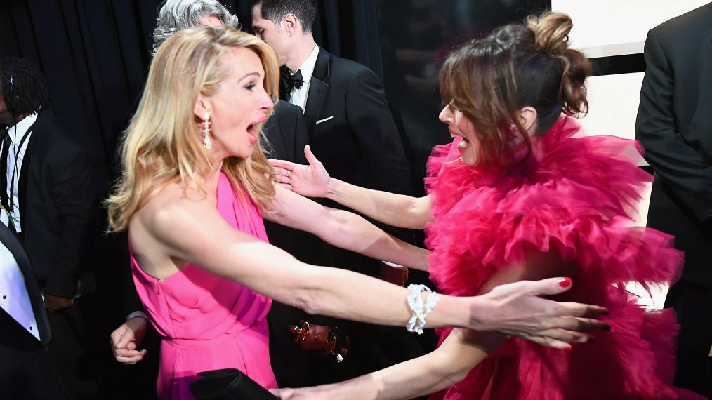 Julia Roberts hugs Linda Cardellini backstage during the 91st Annual Academy Awards