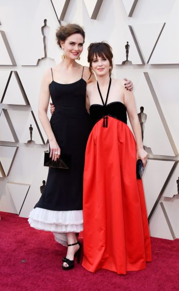 Sisters Emily and Zooey Deschanel attend the 91st Annual Academy Awards