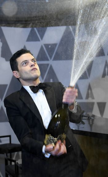 Rami Malek sprays champagne during the 91st Annual Academy Awards Governors Ball at Hollywood and Highland on February 24, 2019