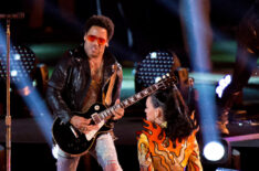 Katy Perry and Lenny Kravitz perform onstage during the Pepsi Super Bowl XLIX Halftime Show at University of Phoenix Stadium