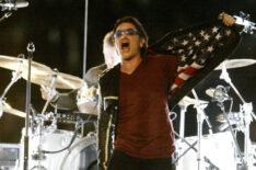 U2 performs during halftime of Super Bowl XXXVI