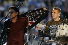Bono and the band U2 perform during the halftime show at Superbowl XXXVI at the Superdome in New Orleans