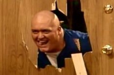 King Kong Bundy breaking his head through the door on 'Married With Children'