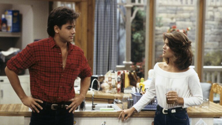 John Stamos as Jesse Katsopolis and Lori Loughlin as Becky Katsopolis on Full House - Season 6 - 'Be True to Your Preschool'
