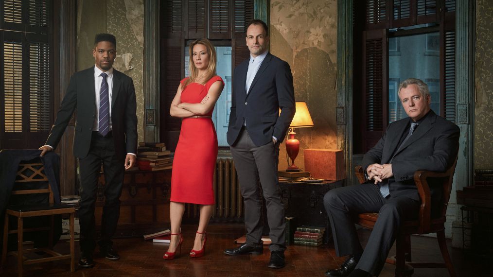 Jon Michael Hill as Detective Marcus Bell, Lucy Liu as Joan Watson, Jonny Lee Miller as Sherlock Holmes, and Aidan Quinn as Captain Thomas Gregson in Elementary