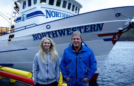 Mandy Hansen and Sig Hansen standing in front of the Northwestern at dock