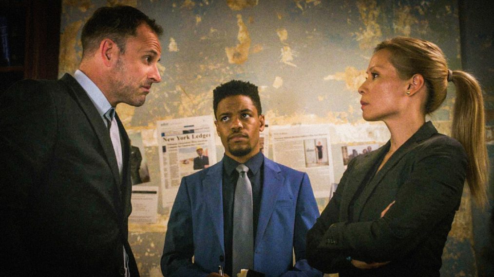 Jonny Lee Miller as Sherlock Holmes, Jon Michael Hill as Detective Marcus Bell, Lucy Liu as Joan Watson in Elementary