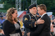Wounded veteran Earl Granville, who lost his brother in the aftermath of war, shakes the hand of Gary Sinise