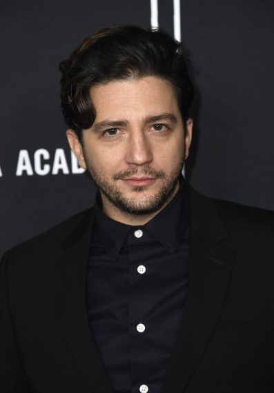 John Magaro attends the Premiere of Netflix's 