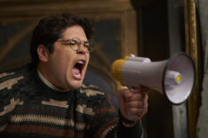 Harvey Guillen as Guillermo with a bullhorn in What We Do in the Shadows