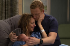 Kim Raver and Kevin McKidd hold their new baby in Grey's Anatomy