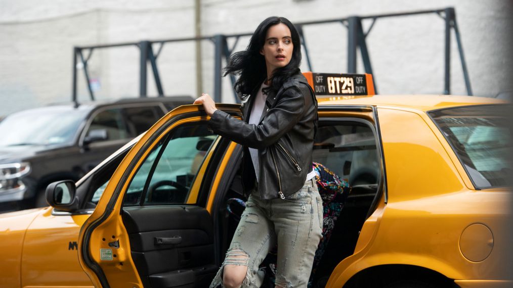 Krysten Ritter existing a taxi in Jessica Jones