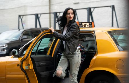 Krysten Ritter existing a taxi in Jessica Jones