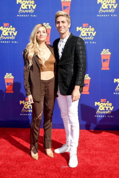 Laura Perlongo and Nev Schulman attend the 2019 MTV Movie and TV Awards
