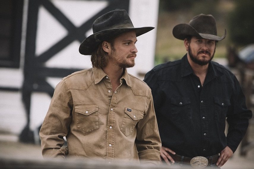 Luke Grimes as Kayce Dutton and Cole Hauser as Rip Wheeler in Yellowstone - Season 2