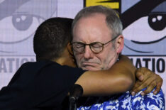 Jacob Anderson and Liam Cunningham hug at the 'Game Of Thrones' Panel