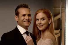 Gabriel Macht as Harvey Specter, Sarah Rafferty as Donna Paulsen in Suits