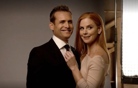 Gabriel Macht as Harvey Specter, Sarah Rafferty as Donna Paulsen in Suits