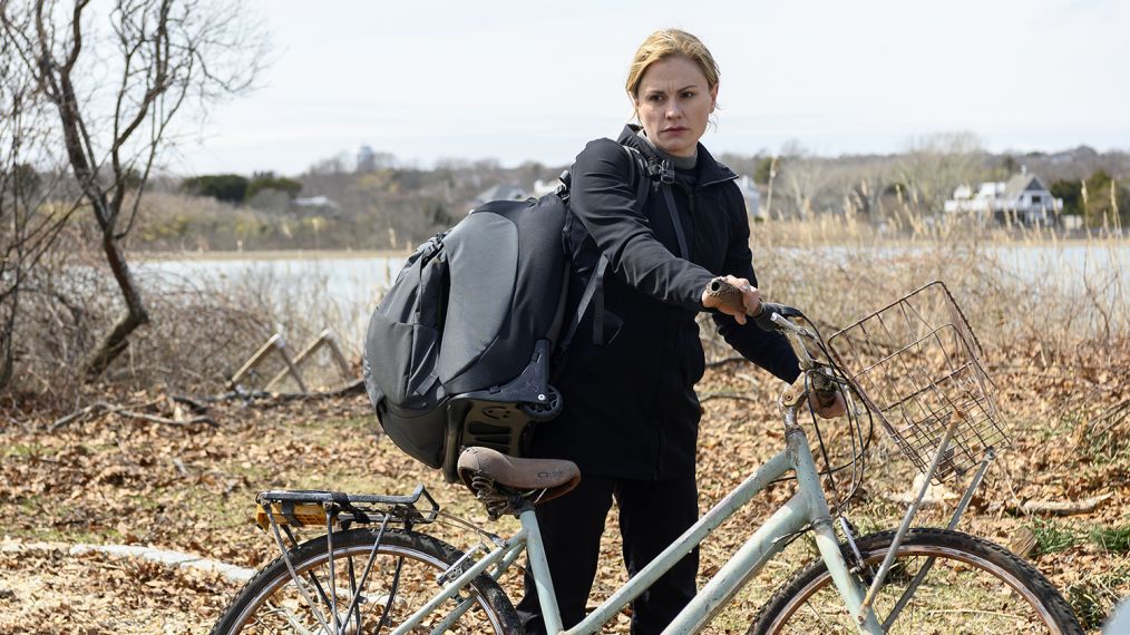 Anna Paquin riding a bicycle in The Affair