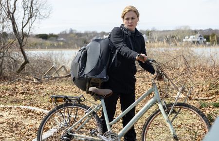 Anna Paquin riding a bicycle in The Affair