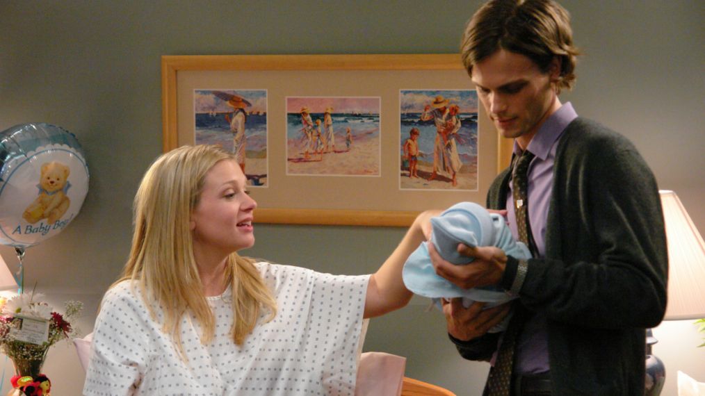 Agent Jareau (A.J. Cook) shows Dr. Reid (Matthew Gray Gubler) her new baby on Criminal Minds - 'Memoriam'