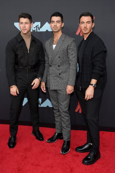 Nick Jonas, Joe Jonas, and Kevin Jonas attend the 2019 MTV Video Music Awards