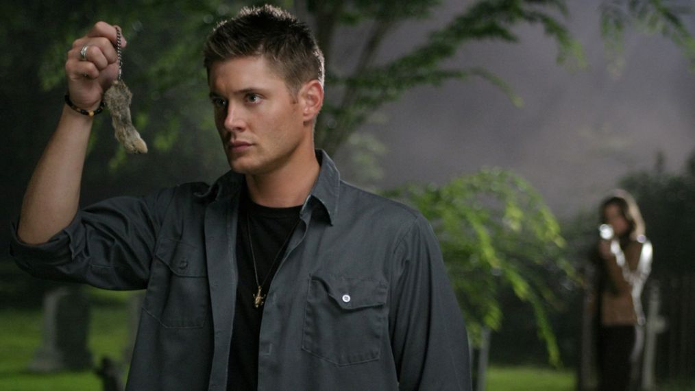 Jensen Ackles as Dean holding a rabbit's foot in Supernatural - 'Bad Day at Black Rock'