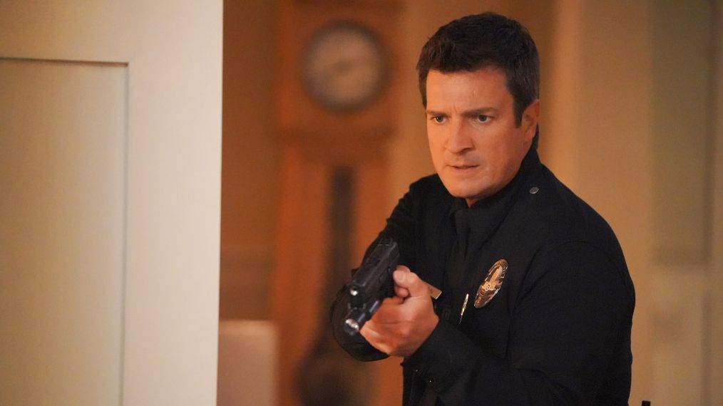 Nathan Fillion points a gun in The Rookie