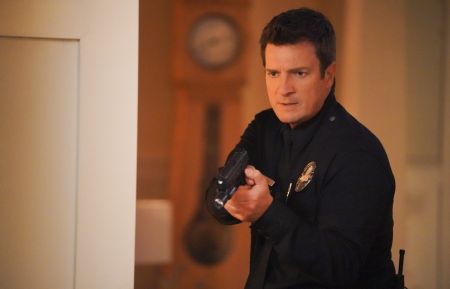 Nathan Fillion points a gun in The Rookie