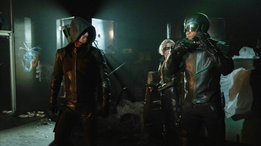 Stephen Amell as Oliver Queen/Green Arrow, Katie Cassidy as Laurel Lance/Black Siren, and David Ramsey as John Diggle/Spartan in Arrow - 'Starling City'