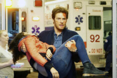 Nick Gehlfuss carrying patient in Chicago Med - Season 5, 'Never Going Back To Normal'