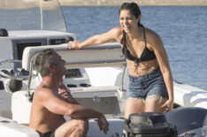 Taylor Kinney as Kelly Severide and Miranda Rae Mayo as Stella Kidd on a boat in Chicago Fire - Season 8